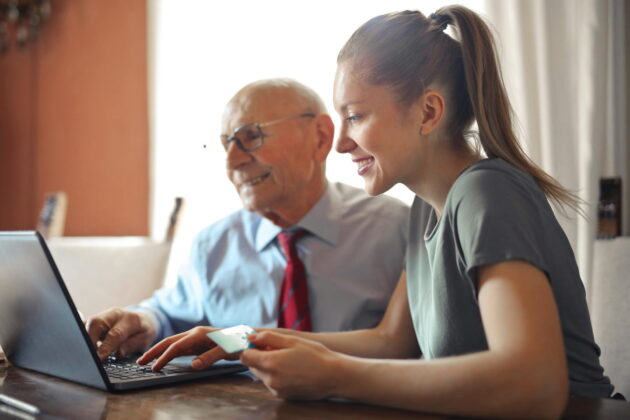 woman with credit card and laptop