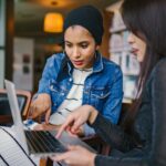 women looking at laptop