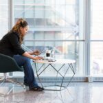 woman looking at laptop