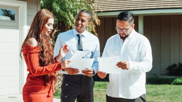 people looking at papers