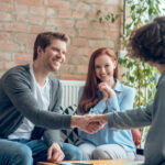 couple meeting with broker